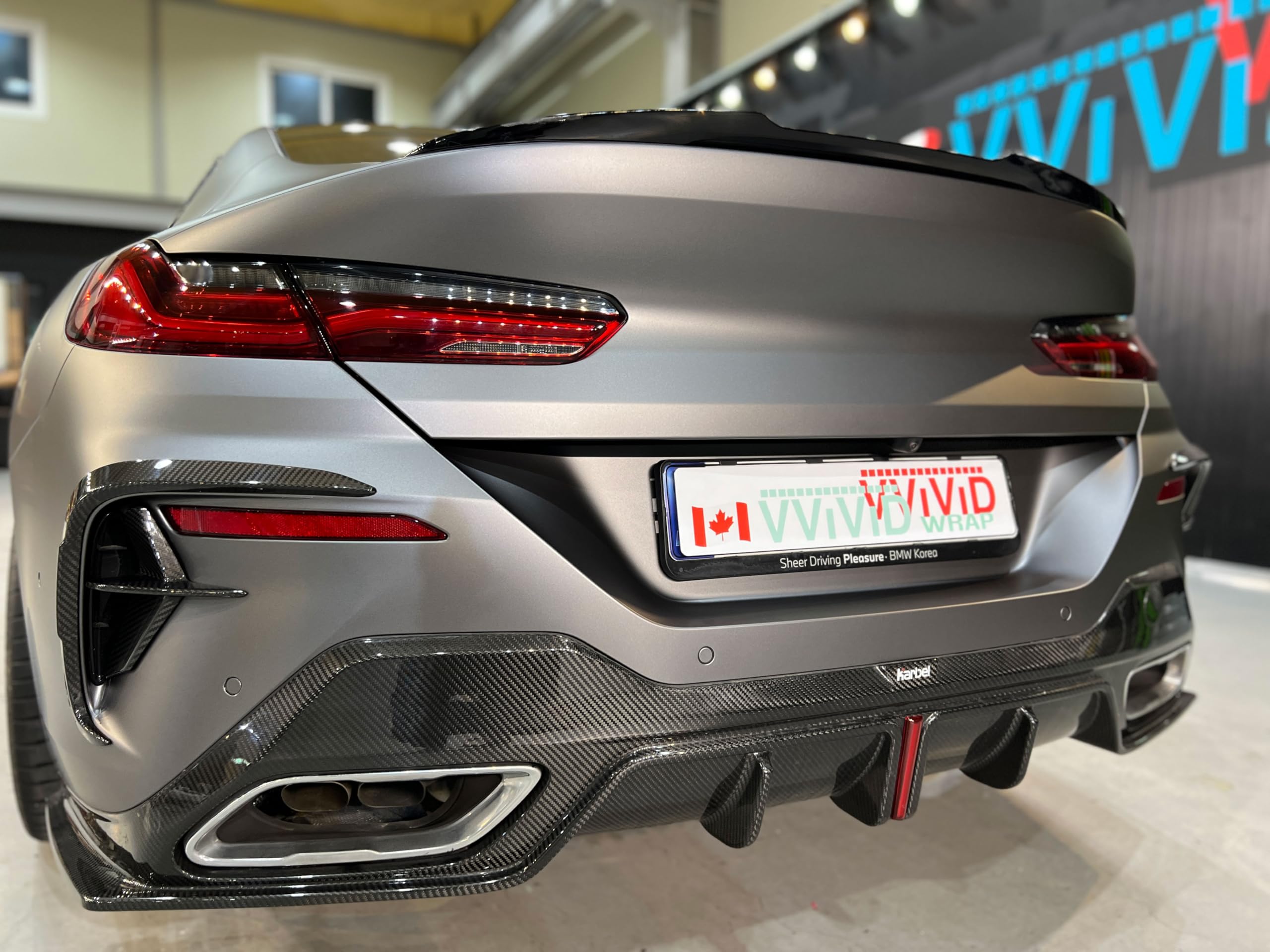 VViViD ColorFusion PPF gunmetal satin stealth roll uses a paint-safe adhesive
