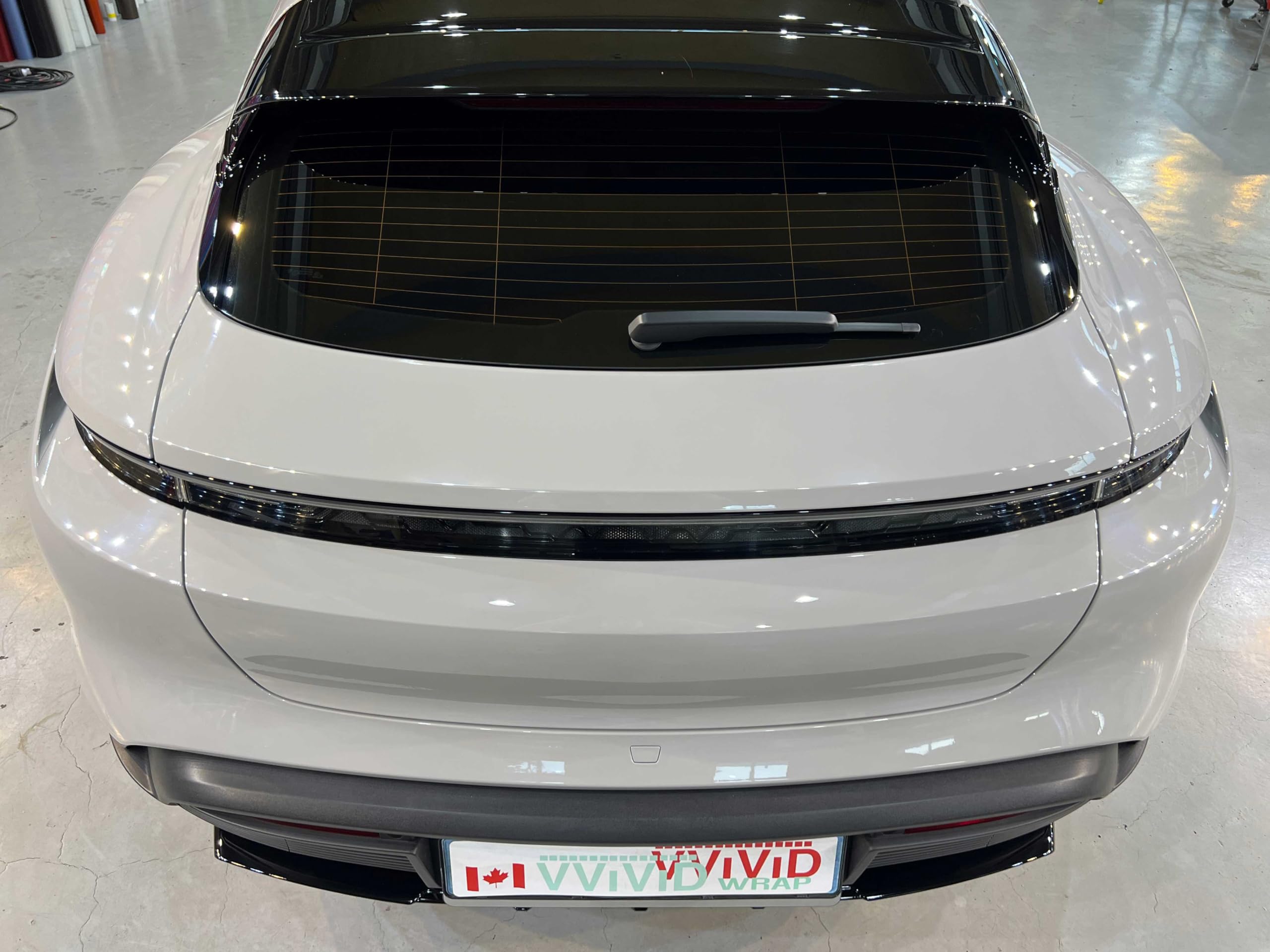 Rear door panel gloss chalk grey ColorFusion finish with bubble-free potential.