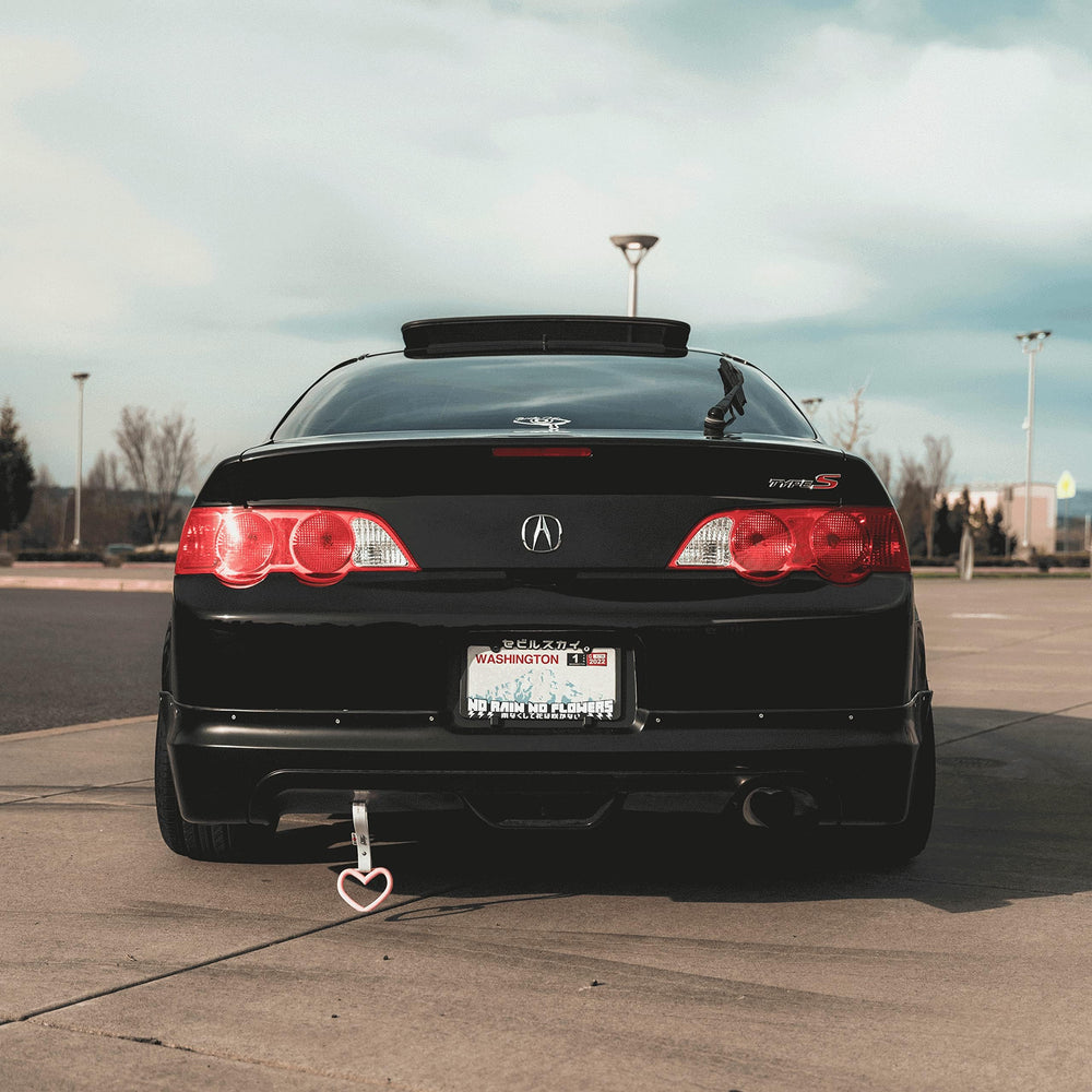 VViViD gloss black vinyl wrap stretches to fit curves for a smooth look