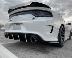 VViViD headlight tint application close-up showing air-release backing.