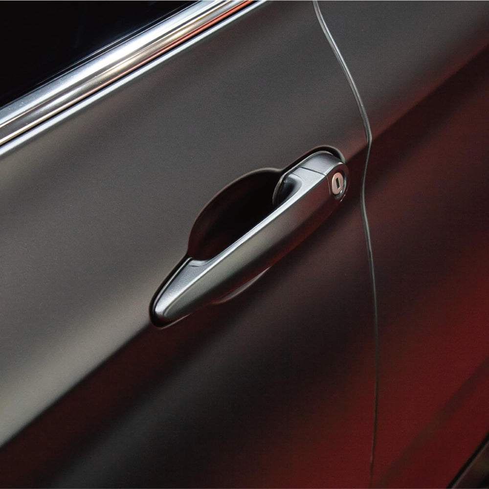 VVIVID+ matte metallic black wrap delivering day and night sheen from ghost particles