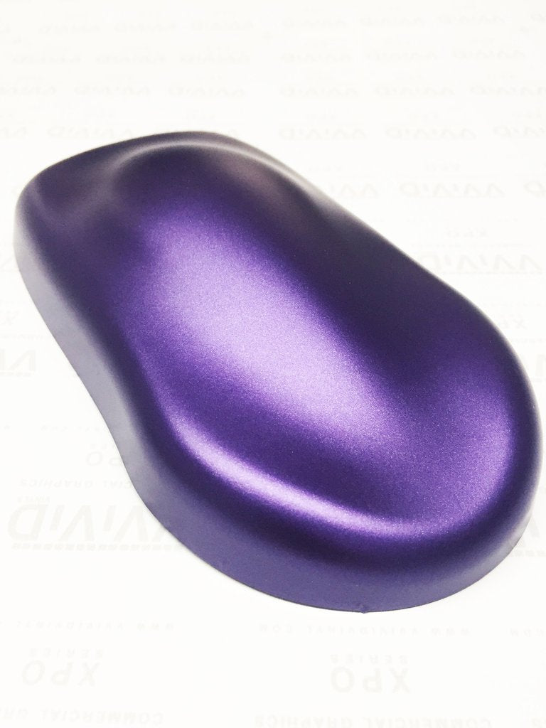 Heat-activated tack shown on VViViD+ ghost wrap during installation.