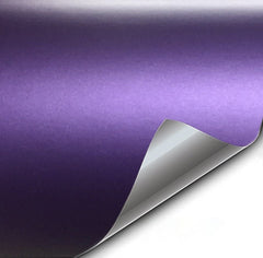 VViViD+ matte metallic purple ghost wrap on a car surface showing strong scratch resistance.