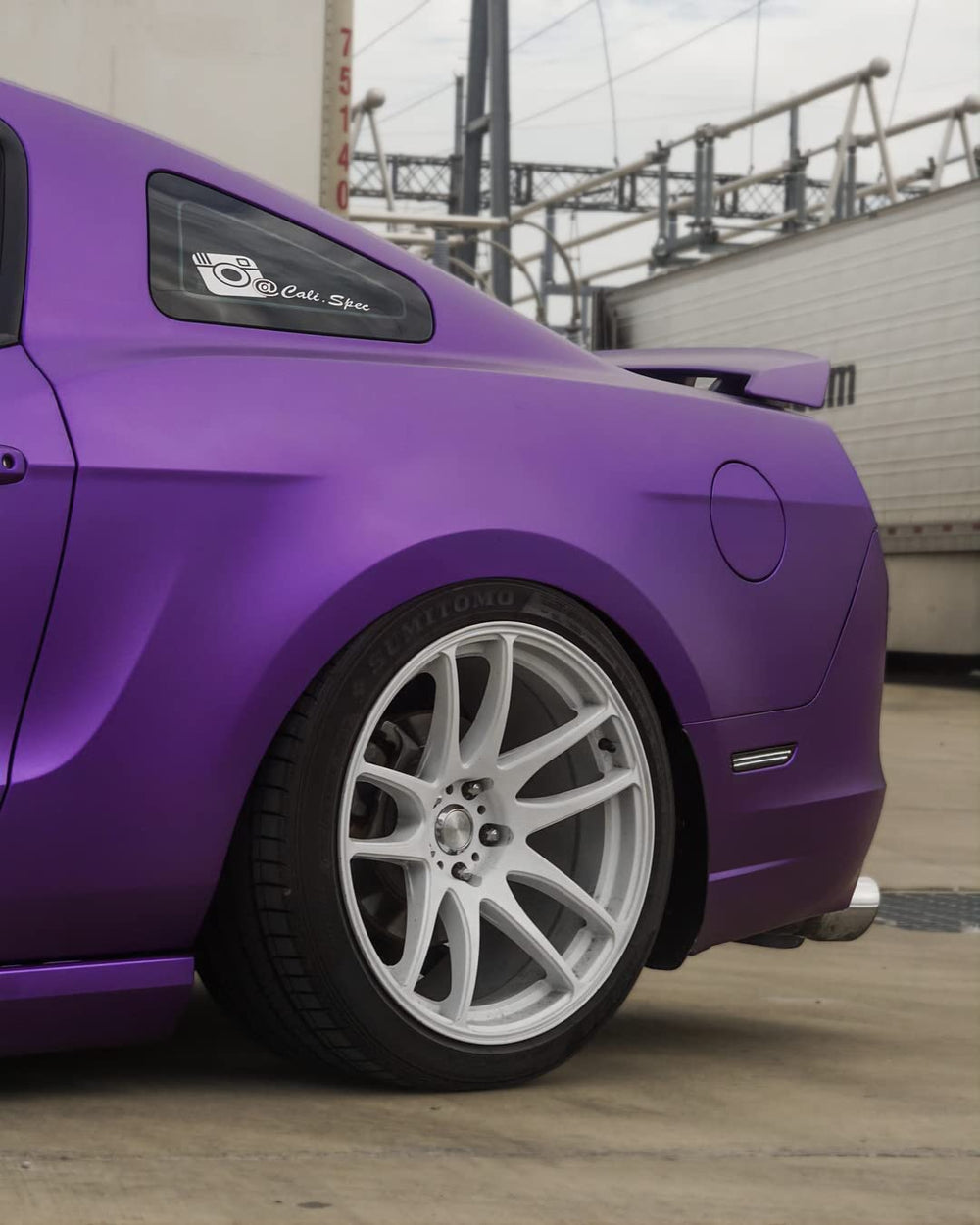 VViViD+ matte metallic purple wrap on a vehicle exterior