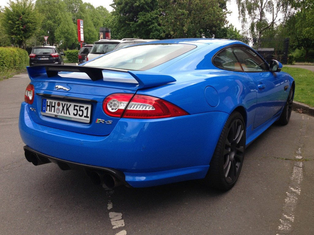 VViViD Smurf Blue gloss wrap on car demonstrates bold color with minimal bubbles.