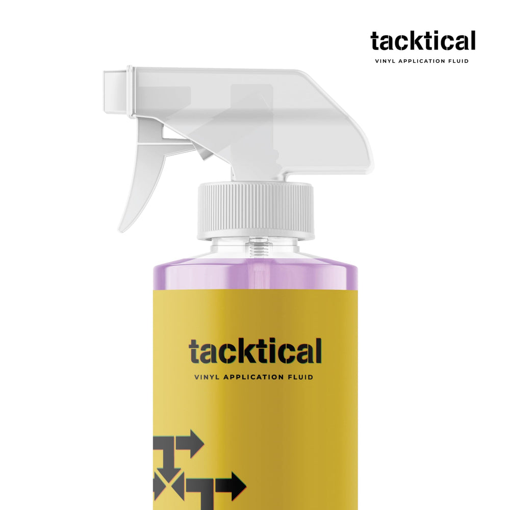 Close-up of spray head delivering even coverage on a curved panel with Tacktical