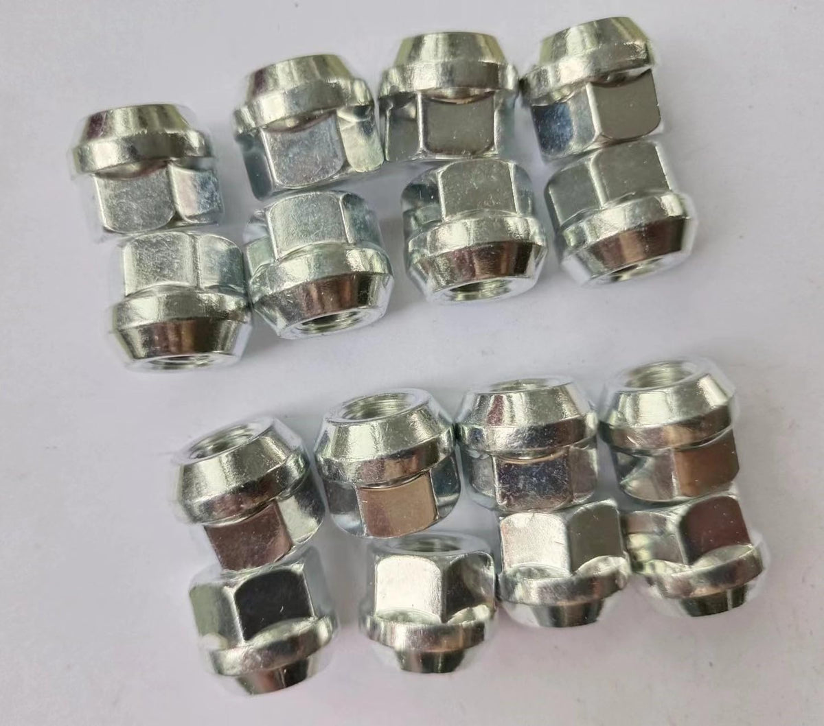 Wantone Racing 16-piece M10x1.25 ATV lug nuts set, ready for replacement and OEM-style fit.