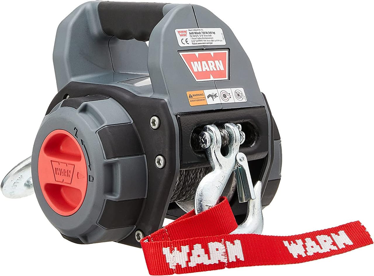 Integrated hawse fairlead and rigging hooks on WARN Winch ensure smooth connections.