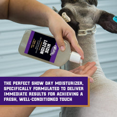 Weaver Livestock Hide Lotion White bottle applying to clipped hide areas for a fresh finish