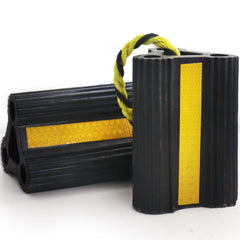 WECARLLE wheel chocks durable rubber block provides tire traction for trucks and RVs.