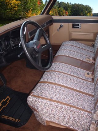 West Coast Auto Baja seat cover front pocket detail for convenient storage.