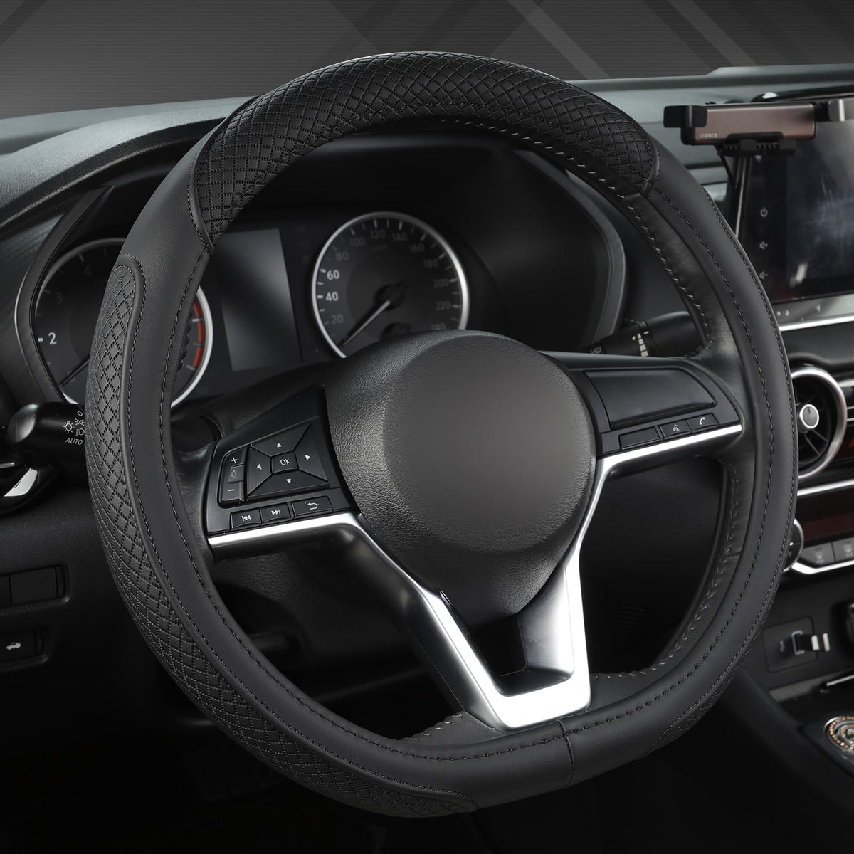 West Llama D-shaped black steering wheel cover on Nissan Rogue enhances grip and control.