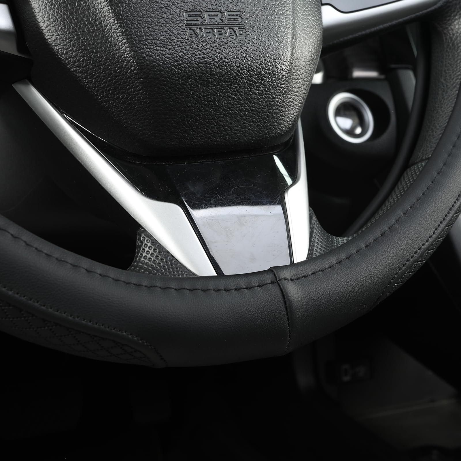 West Llama Ford F-350 steering wheel cover in black blends interior style while protecting the wheel