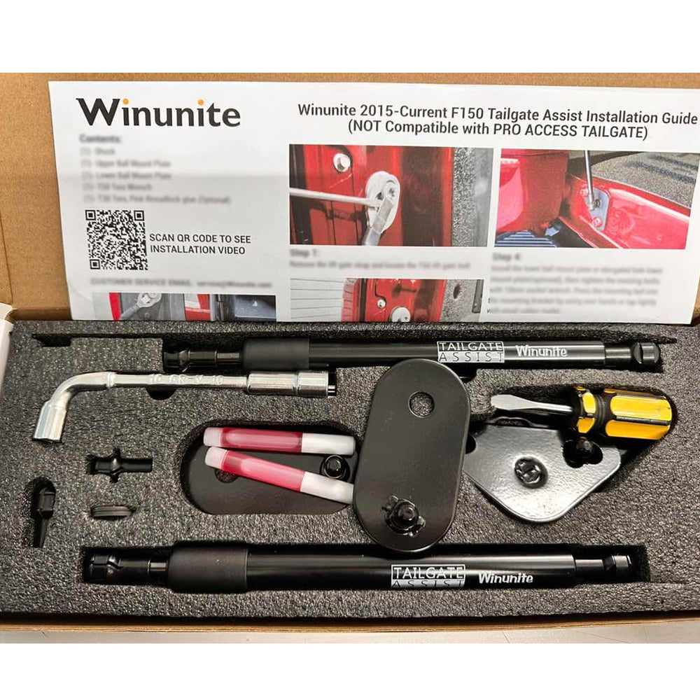 Winunite tailgate assist with dual struts on the passenger side for stable support.