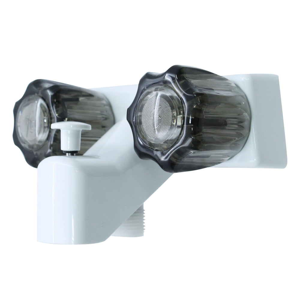 WMF RV faucet with 4-inch center and double handles for precise temperature control in a small bathroom