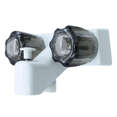 WMF RV faucet with 4-inch center and double handles for precise temperature control in a small bathroom