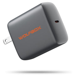 Wolfbox 65W Type-C PD charger front view showing compact design for fast charging.