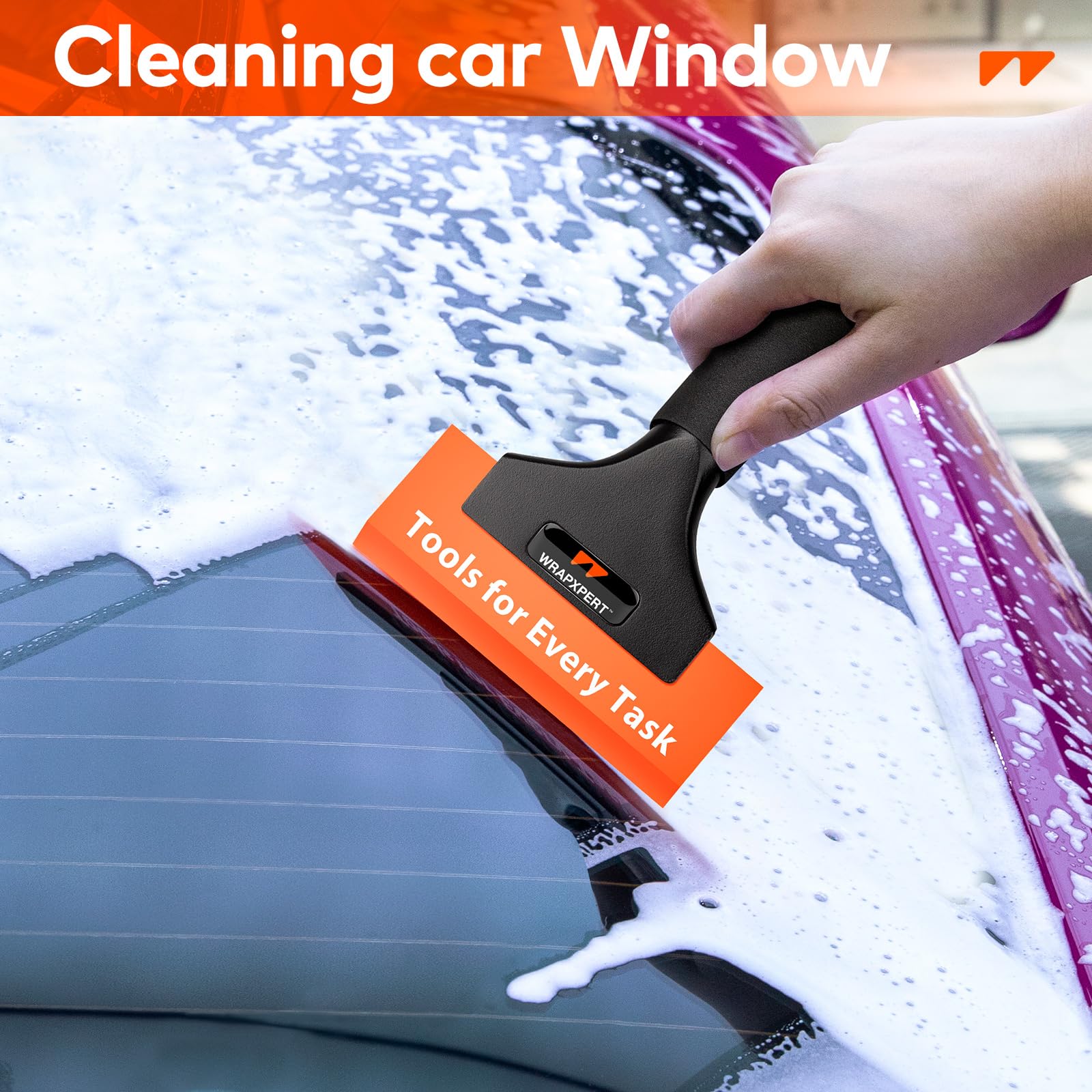 WRAPXPERT mini quarter window squeegee reaching tight curves during tinting.