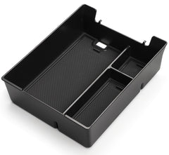 Wuchurth Rivian tray in place demonstrating organized center console for daily driving.