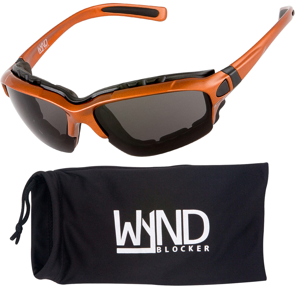 WYND Blocker motorcycle glasses, front view with orange frame and smoke lens for wind protection.