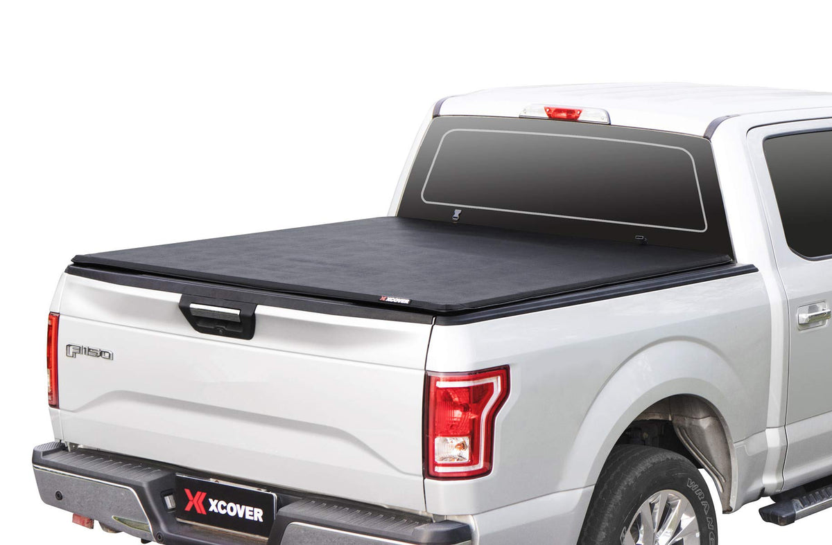 X XCOVER soft roll-up tonneau on a 5.6 ft bed, front view shows secure fit.