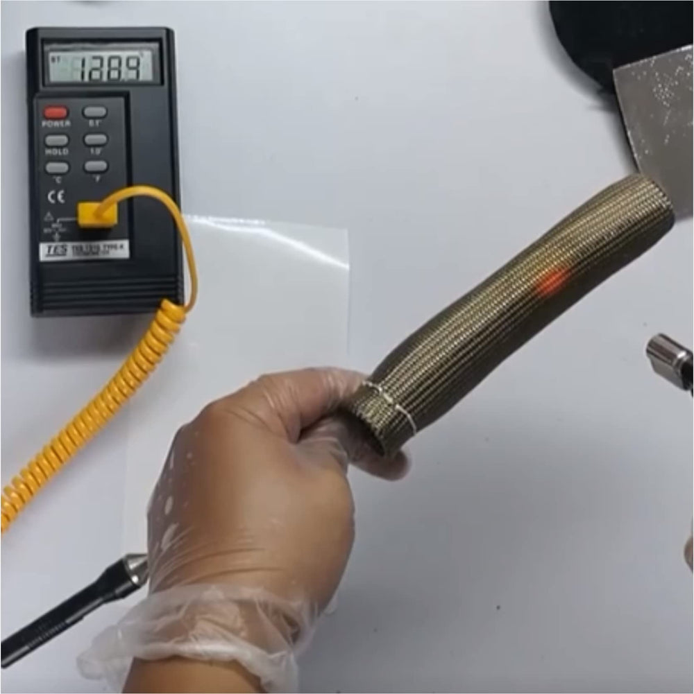 XINPENGLIU heat shield installed over a spark plug boot for high-heat protection