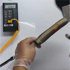 XINPENGLIU heat shield installed over a spark plug boot for high-heat protection