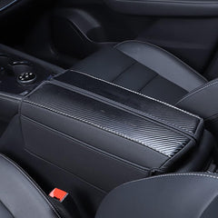 XITER Rogue Logo leather armrest cover on center console for protection.