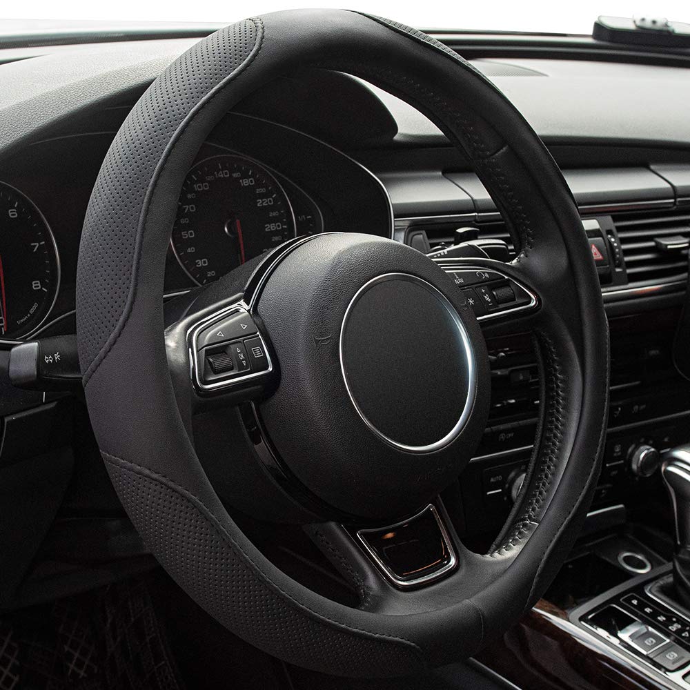 Xizopucy steering wheel cover on a 14-15 inch wheel with microfiber leather for grip.