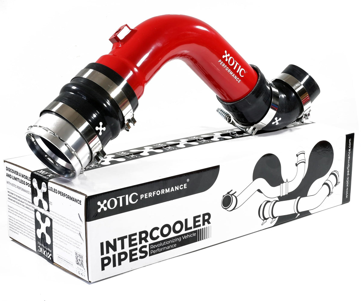 Xotic Performance turbo intercooler outlet pipe visible, engineered for smoother airflow in Ford 6.7L.