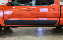 XPEL ARMOR guard on a truck rocker panel preserving paint from debris