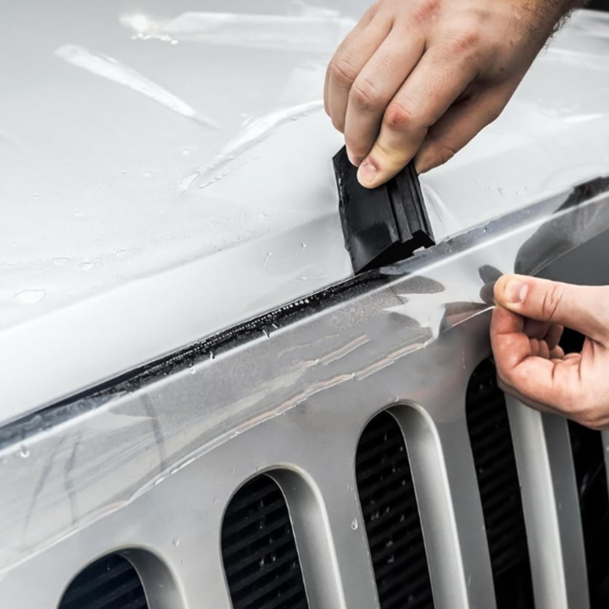 XPEL installation close-up shows a film with strong adhesion and seamless finish.