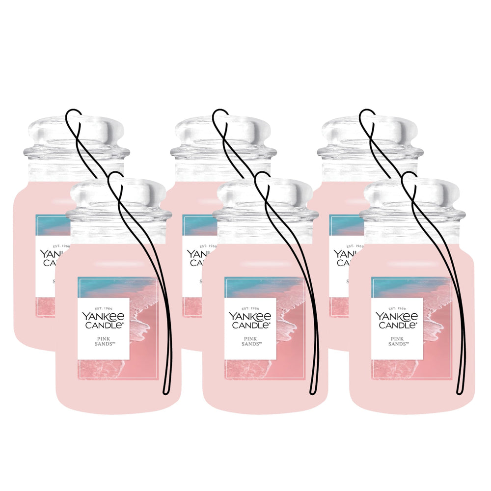 Yankee Candle Car Jar Pink Sands hanging to refresh your car with a tropical scent