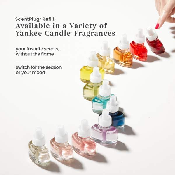 Yankee Candle Car Jar Ultimate Bahama Breeze hanging in car creates ambiance.
