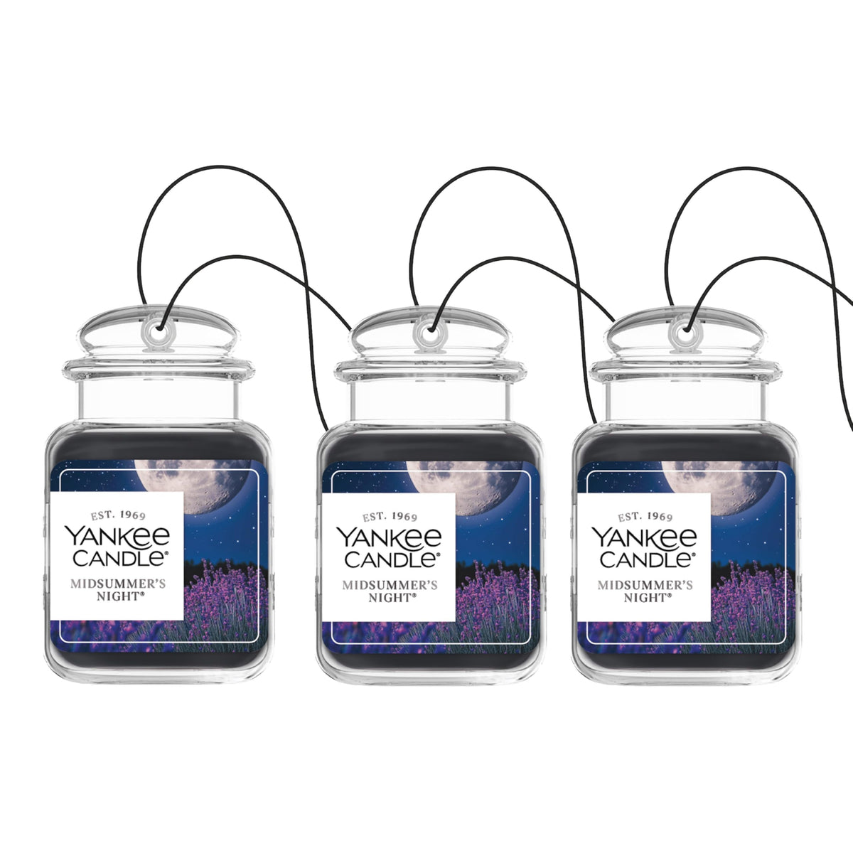 Yankee Candle Car Jar Ultimate Midsummer's Night hanging in car for lasting freshness.