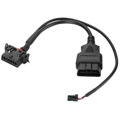 YOLLKY Security Gate Bypass OBD2 Cable attached to a RAM 1500 for quick diagnostics.