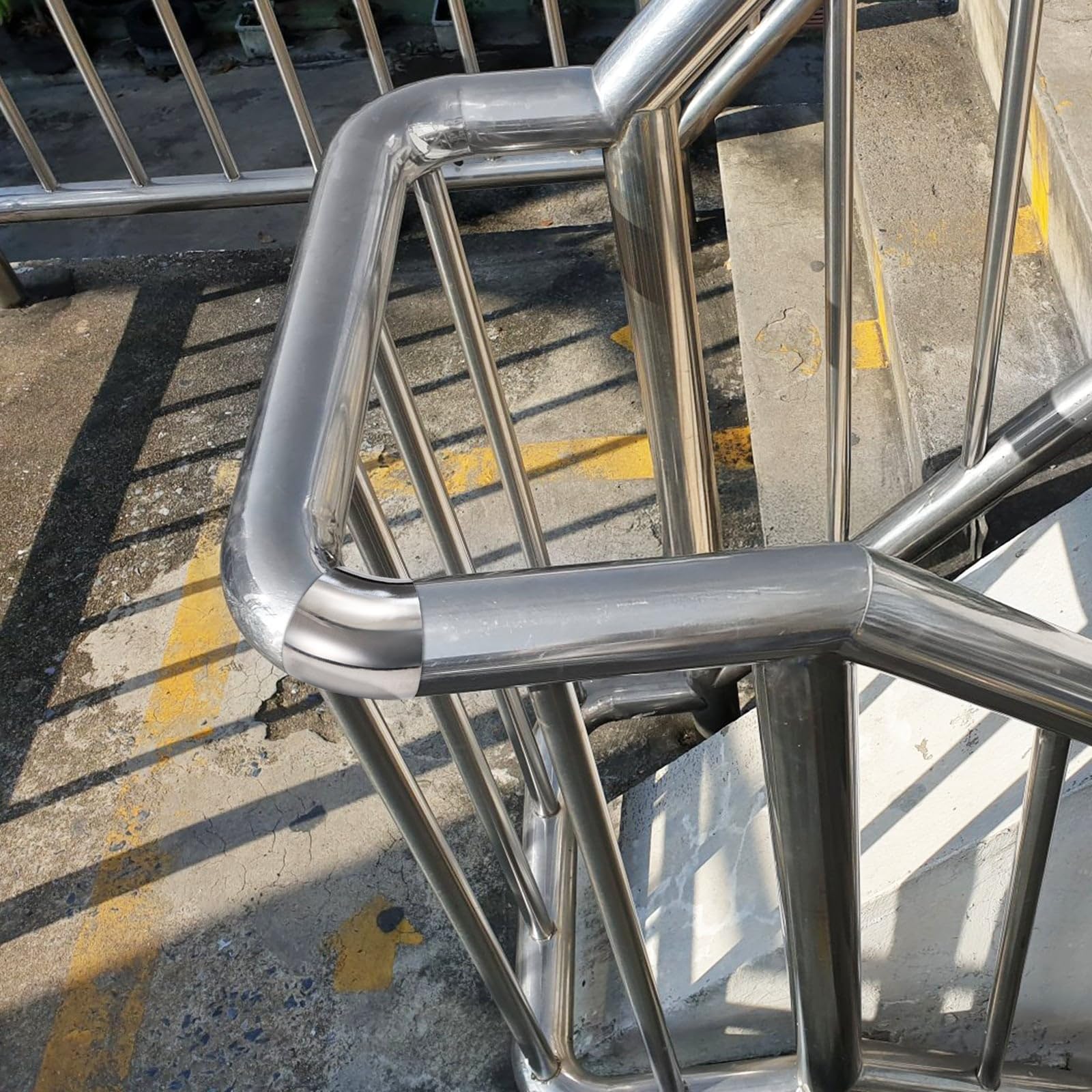 Youeon stair handrail elbow installed on a staircase setup.