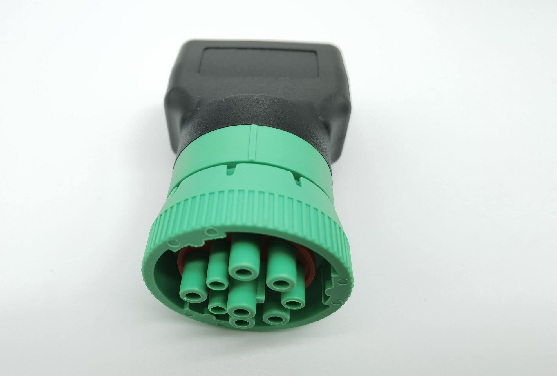 Close-up of rugged green overmold on the YPP adapter