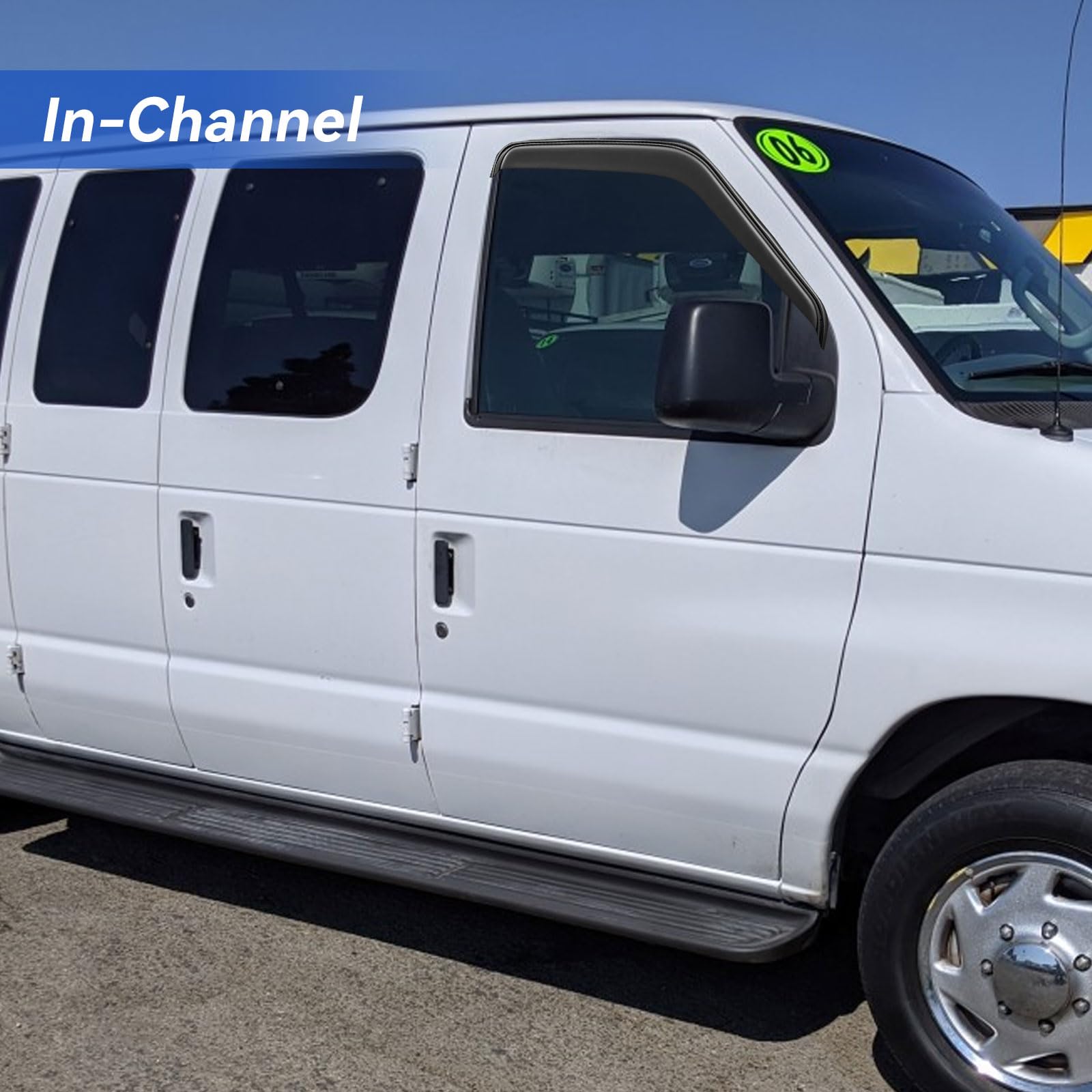 Installed window deflectors on Econoline van offer fresh air while shielding from rain.