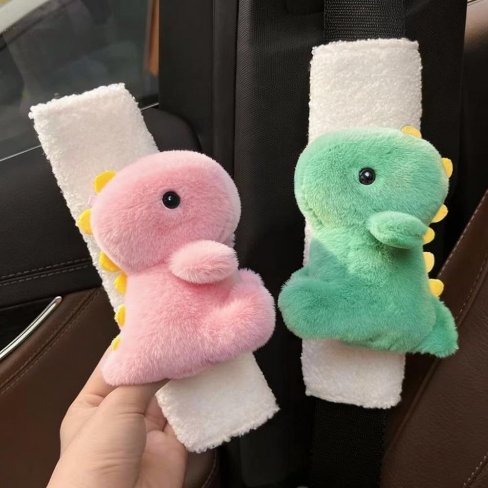 Zigihos pink dinosaur seatbelt pad reduces friction for kid car rides.