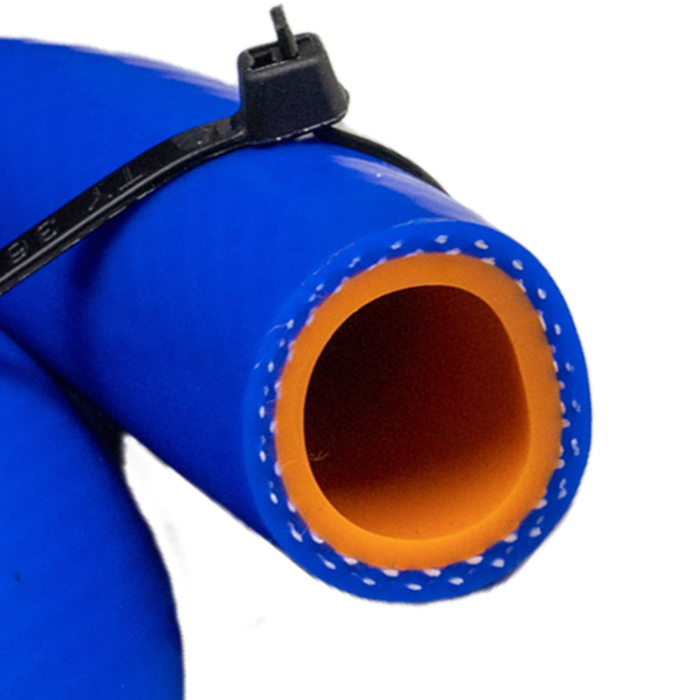 ZIMFLEX silicone heater hose blue reinforced installed in engine supports water and warm air transport.