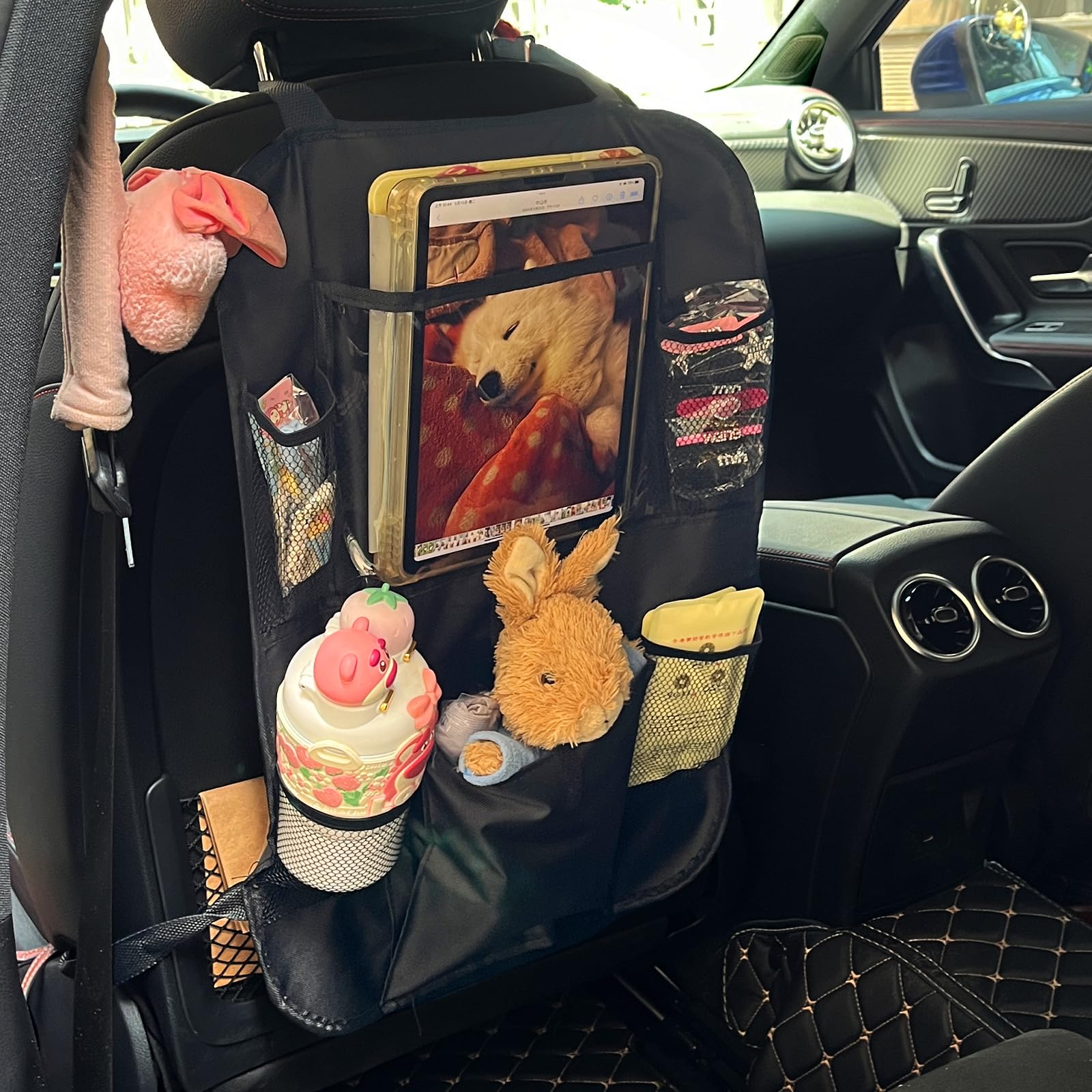 Zntezed road-trip setup creates a tidy mobile play area for families.