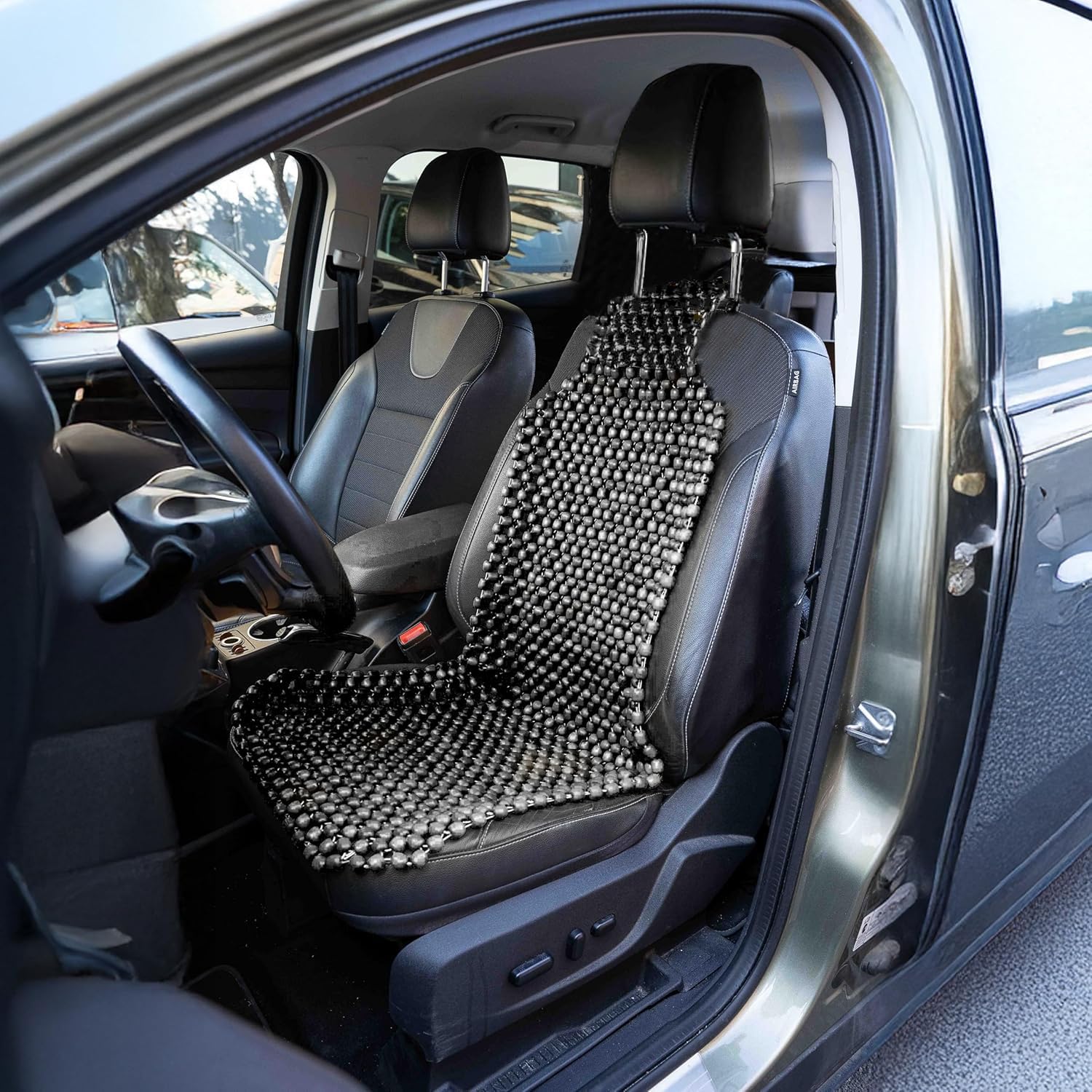 ZONETECH Wood Beaded Seat Cushion in car seat provides gentle massage.