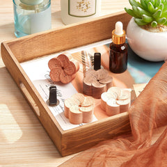 Zubebe Aroma wood diffuser clipped to a car vent for on-the-go fragrance