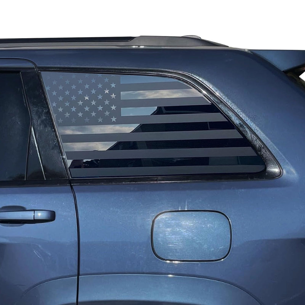 Zxiaochun rear side window USA flag decal adds patriotic style to Jeep Grand Cherokee.